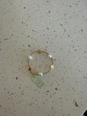 eNewton Signature Cross Pearl bracelet